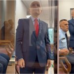 Meta shfaqet i buzëqeshur në sallën e gjyqit, përshëndet me dy gishta dhe simbolin e shqiponjës